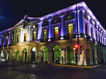 Illuminated building at night