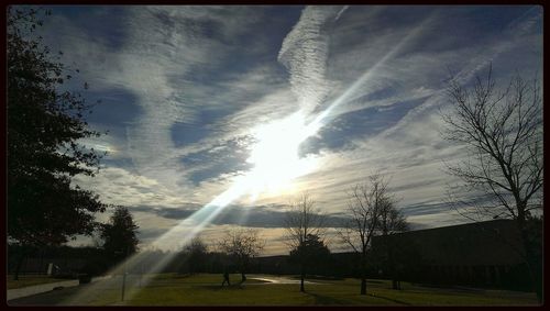 Scenic view of landscape against cloudy sky