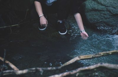 High angle view of man holding water