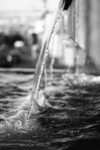 Close-up of water drops on fountain