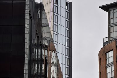 Low angle view of buildings against sky