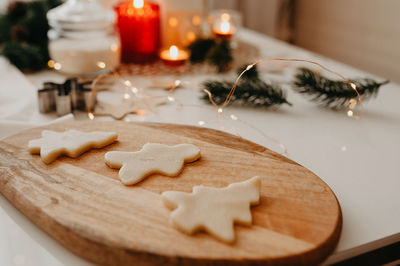Raw cookie in the form of a christmas tree, snowflakes and a man 