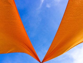 Low angle view of built structure against blue sky