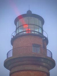 Low angle view of water tower against clear sky