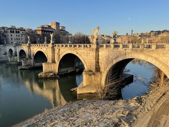 Arch bridge over river