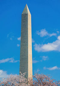 Low angle view of monument against blue sky