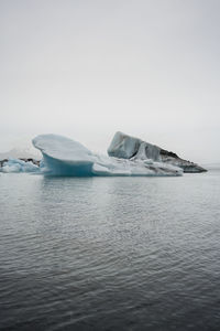 Scenic view of frozen sea against sky