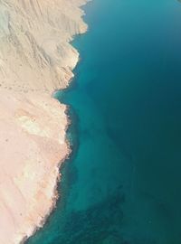 Scenic view of sea against blue sky