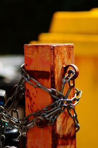 Close-up of rusty tied up of metal chain