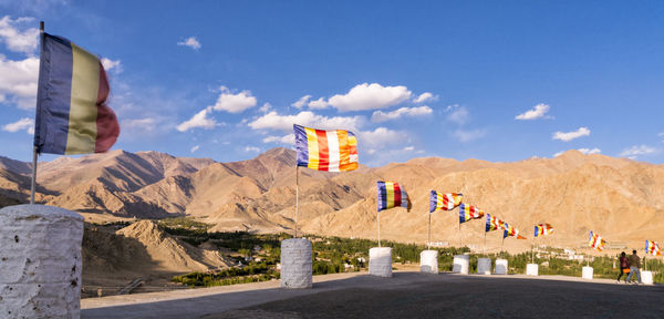 View of flag on road against sky