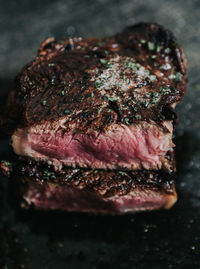 High angle view of meat on barbecue grill