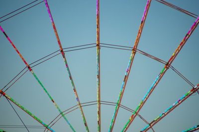 Low angle view of metallic structure against sky