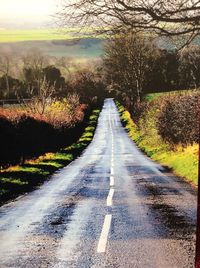 Country road passing through landscape