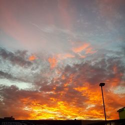 Low angle view of cloudy sky at sunset