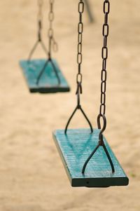 Empty swings in playground