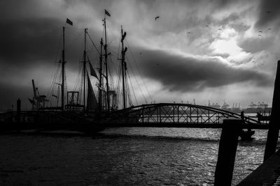 View of bridge against cloudy sky