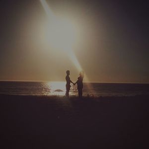 Scenic view of sea at sunset