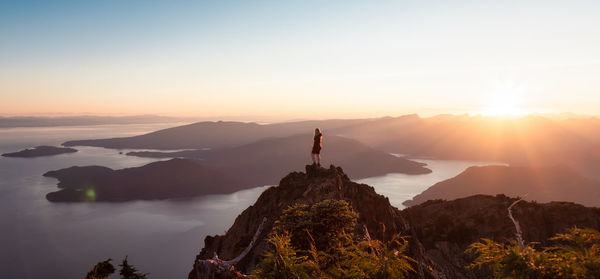 Scenic view of mountains against sky during sunset