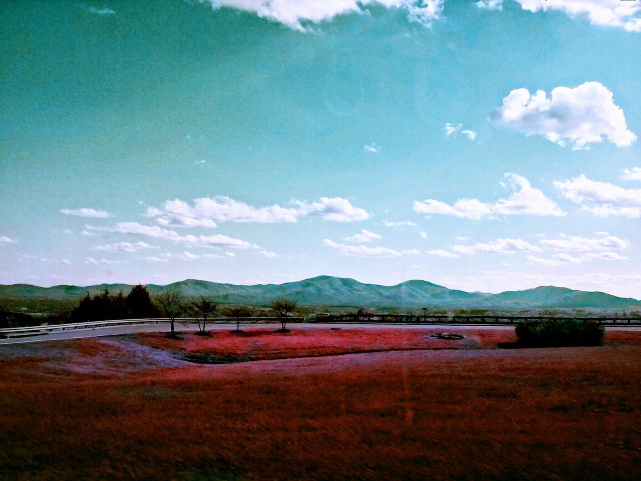 mountain, sky, tranquil scene, tranquility, water, mountain range, scenics, lake, beauty in nature, landscape, cloud - sky, nature, cloud, blue, river, non-urban scene, countryside, idyllic, day, remote