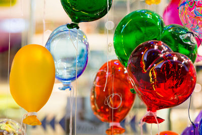 Colorful balloons hanging outdoors