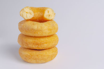 Close-up of donut against white background