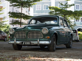 Vintage car on street in city