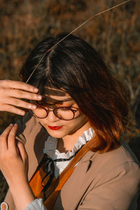 Close-up of woman in eyeglasses