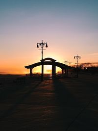 Scenic view of beach against sky during sunset