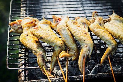 Close-up of meat on barbecue grill