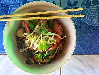 High angle view of chopped vegetables in bowl on table