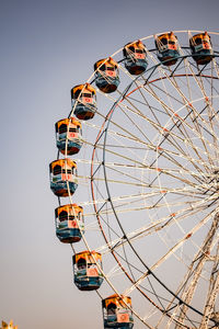 Closeup of multi-coloured giant wheel during dussehra mela in delhi, india. bottom view giant wheel