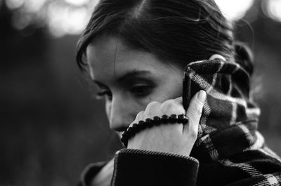 Close-up of thoughtful mid adult woman