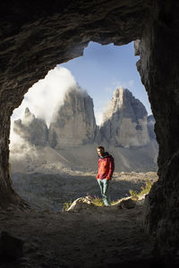 Full length of man standing on rock