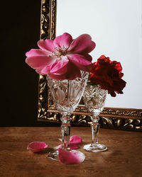 Close-up of pink flowers in vase on table