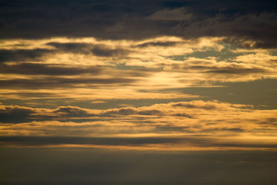 Low angle view of dramatic sky during sunset