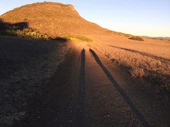 Dirt road passing through landscape