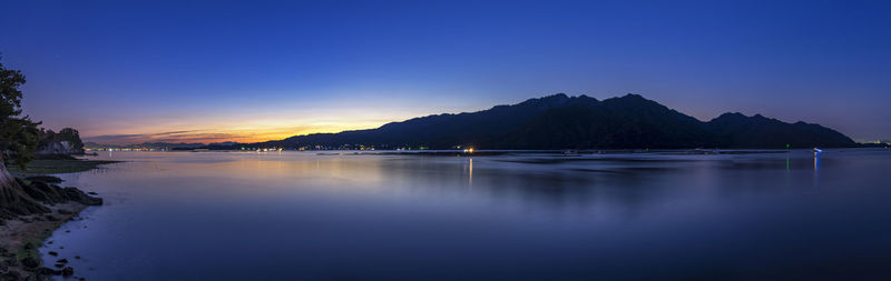 Scenic view of sea against sky at sunset