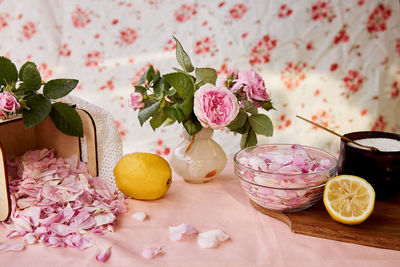 Homemade natural tea rose jam preparing with sugar, lemon and tea rose petals. healthy recipe. 