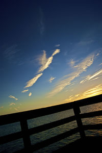 Scenic view of sea against sky at sunset