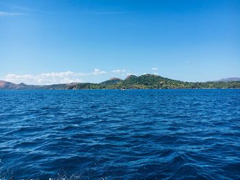 Scenic view of blue sea against sky