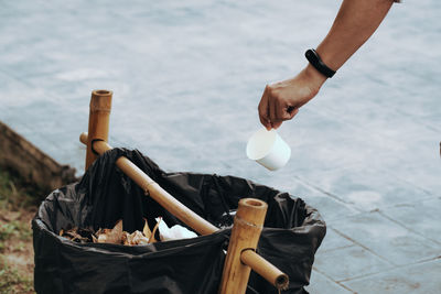 Midsection of man preparing food