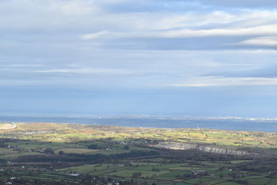 Aerial view of townscape against sky