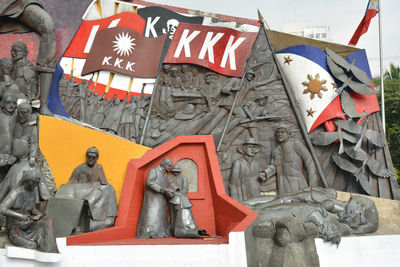 Low angle view of statue against sky