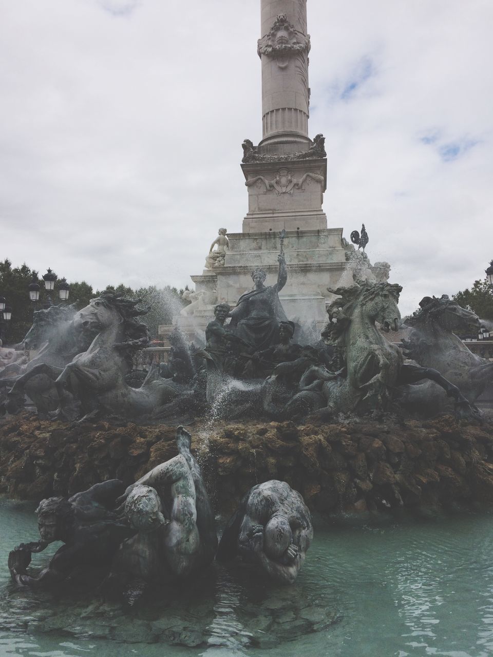 water, rock - object, sky, cloud, rock formation, tranquility, scenics, cloud - sky, tranquil scene, travel destinations, non-urban scene, geology, tourism, nature, cliff, waterfront, famous place, physical geography, beauty in nature, outdoors, day, majestic, eroded, stone material, sea, non urban scene, history