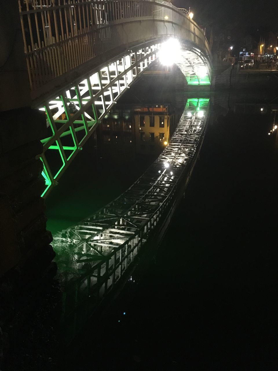 REFLECTION OF ILLUMINATED BUILDINGS IN WATER