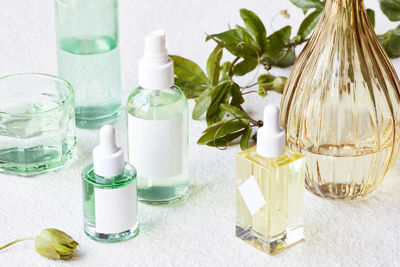 Collection of bath oil products and glassware