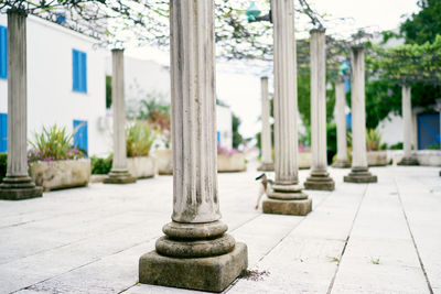 Stone wall by street in city