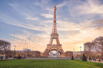 Famous tour eiffel paris iconic building at sunset