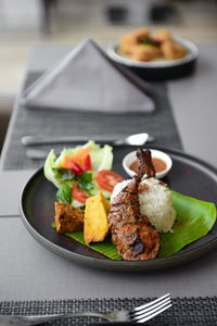 Close-up of food in plate on table