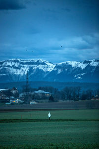 Scenic view of snowcapped mountains against sky